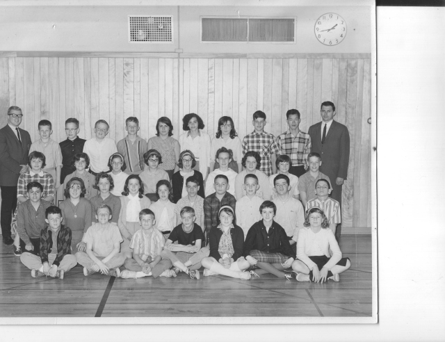 That's me, back row 2nd child from the left. The only boy with glasses. 