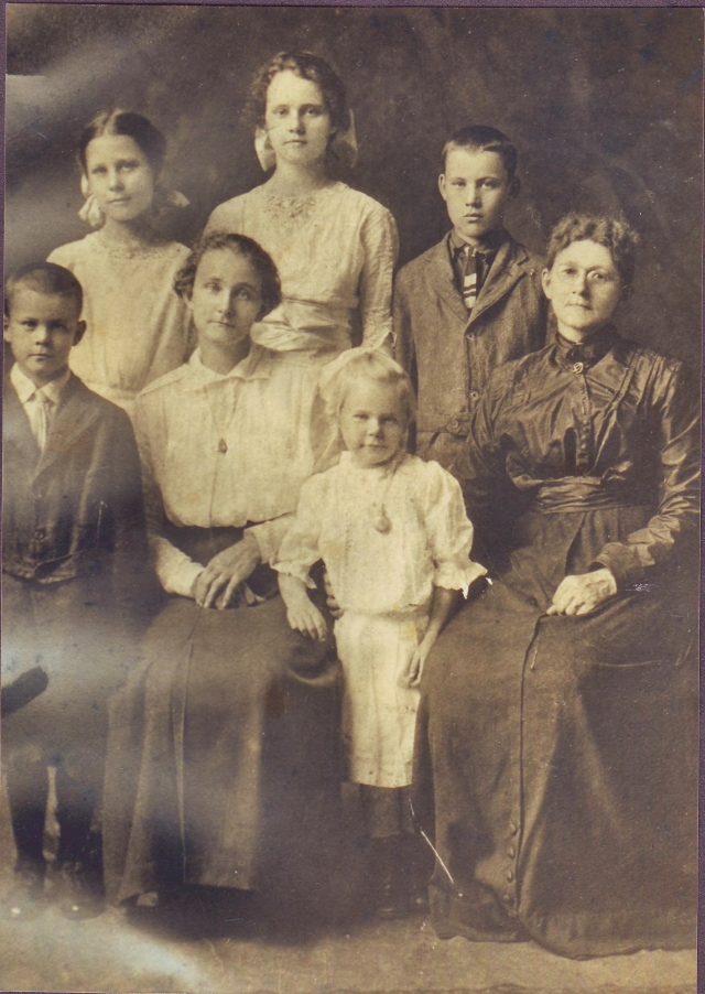 From left to right. Back Row; Pauline Bonnett, Florence Bonnett and Claude Bonnett.  Front Row Harry Bonnett, Bessie Barney Bonnett, Verna Bonnett, and Mary Guyette Barney Douglas. Picture taken about 1913. 
